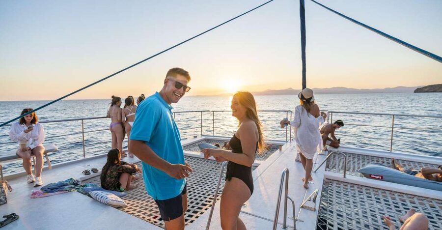 S'Arenal: Sunset Catamaran Cruise with BBQ - Cap Enderrocat at sunset: where the views go from pretty to wow