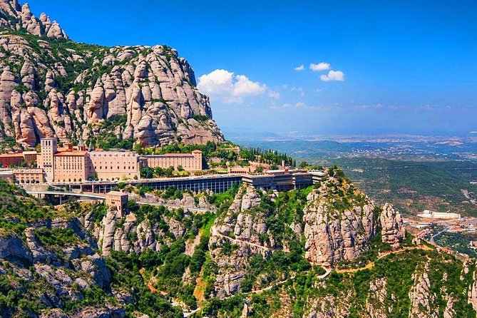 Sagrada Familia & Montserrat Small Group Tour with Hotel pick-up - Waterfront to Old Town: Las Ramblas, Market views, and the Port