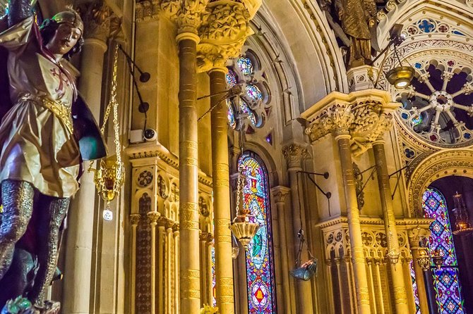 Sagrada Familia & Montserrat Small Group Tour with Hotel pick-up - Eixample drive-by: Passeig de Gràcia and the modernist facades you recognize