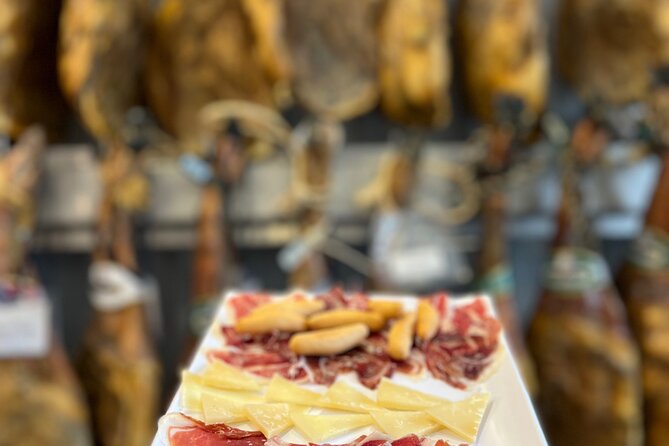 San Sebastian Pintxo Food, Wine & Market Foodie Tour(Small Group) - The Old Square Moment and Calle Mayor: History You Can See While You Eat