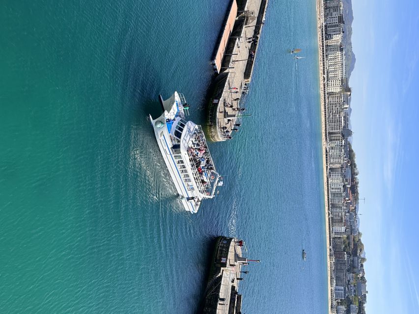 San Sebastian: Sustainable Catamaran Cruise with Audio Guide - Boarding at Catamarán Ciudad San Sebastián, and what to bring