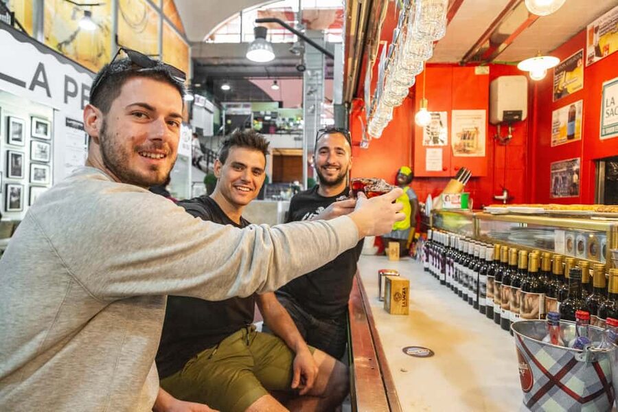 Secret Food Tours Madrid - Starting at Sol: orange umbrella, big-city energy, zero guesswork
