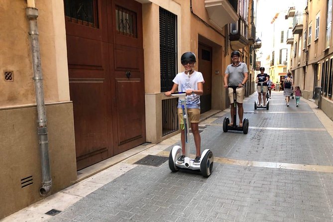 Segway Tour 1 Hour in Palma - Helmeted safety, patient guidance, and riding on old cobblestones