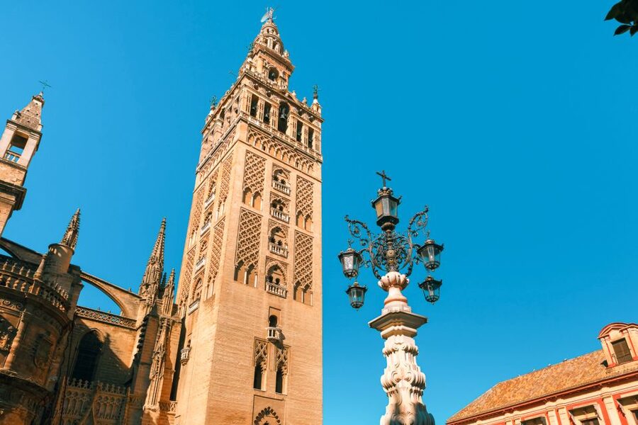 Seville: Alcázar, Cathedral & Giralda Fast Track Guided Tour - Giralda climb: how a bell tower becomes a city viewpoint