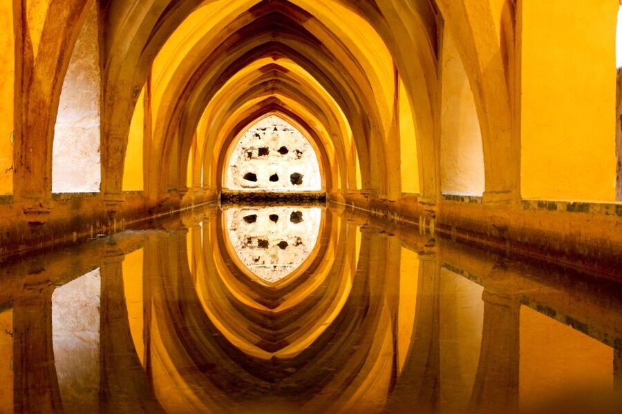 Seville: Alcazar Skip-the-Line Guided Tour with Tickets - Entering the Alcázar: seeing walls as history, not decoration