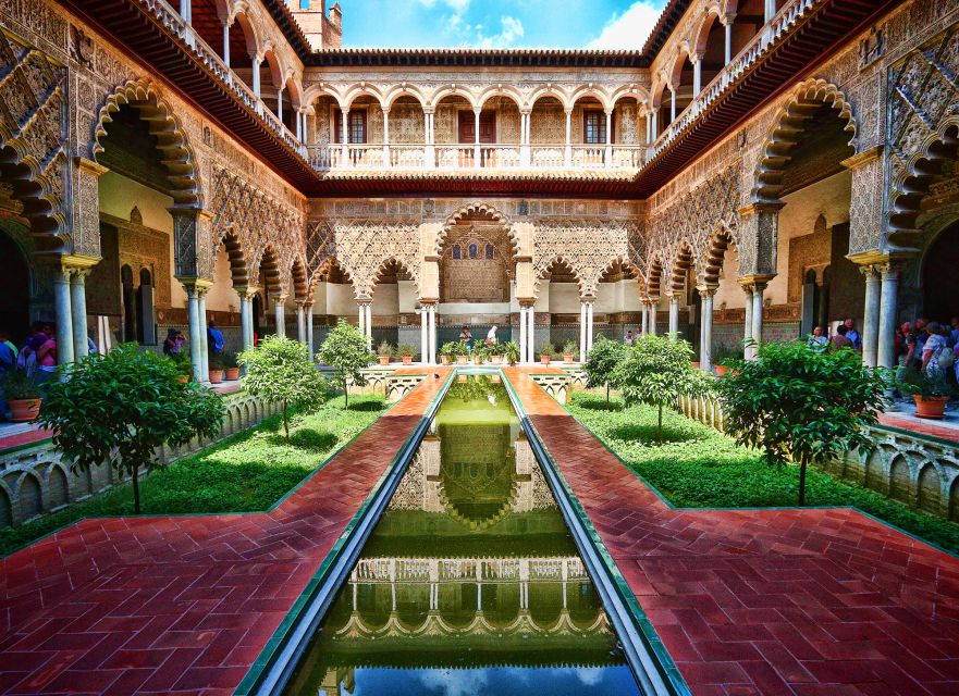 Seville: Alcázar Tour with Tickets Included - Baños de Doña María de Padilla: water, form, and court life details