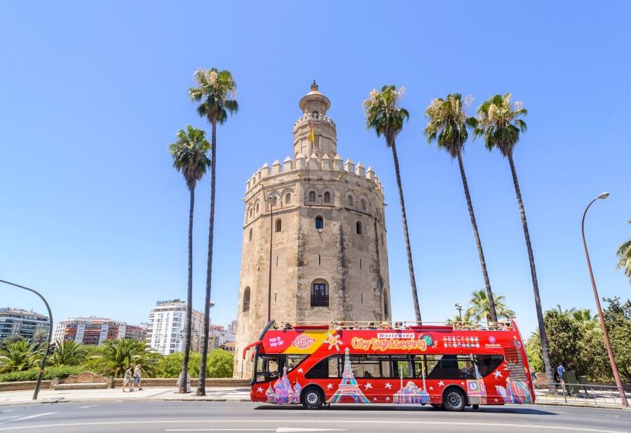 Seville: City Sightseeing Hop-On Hop-Off Bus Tour - On-Board Audio Guide Plus Earphones, The Easy Learning Combo
