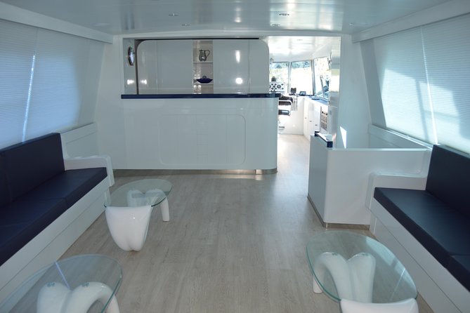 Seville: Cruise along the Guadalquivir River with appetizer - Deck vs. Climate-Controlled Interior: Choose Your Comfort First
