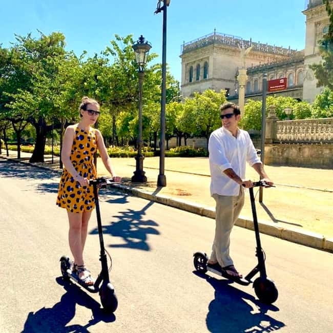 Seville: Electric Bike City Tour - The First Stops: Torre del Oro, Bridges, and Why You Feel the City Fast
