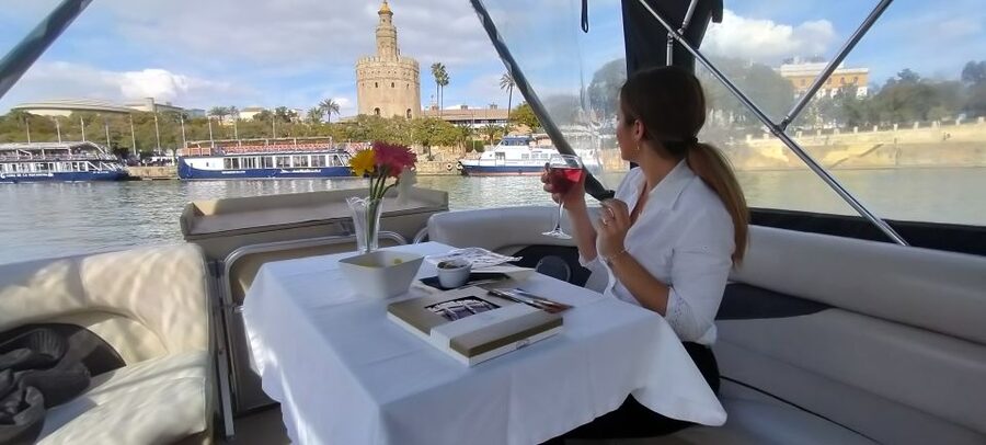 Seville: Exclusive River Boat Tour with Tapas - Live Bilingual Commentary and the Captain’s Style