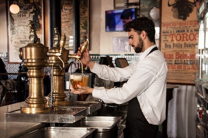 Seville Food Tour: Vermut, Churros & 10+ Tasty Local Dishes - Wooden parasols, an archaeology stop, then your first views