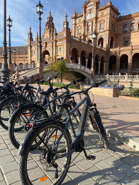 Seville: Guided Tour by Electric Bike - Meeting point at ATD BIKES, and what to wear