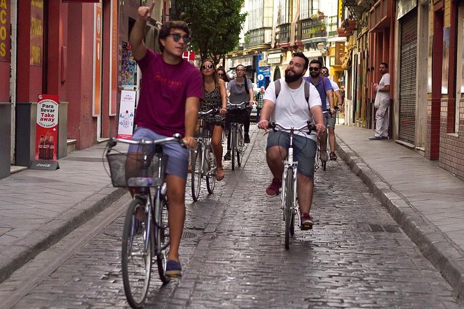 Seville Highlights Bike Tour (English) - Triana: Tiles, Pottery, and Flamenco Culture
