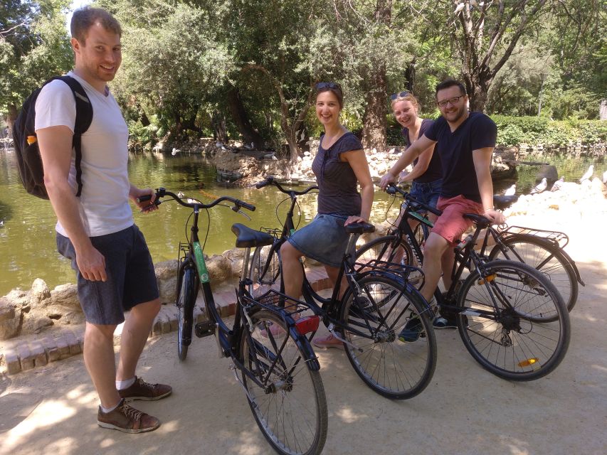 Seville: Highlights Bike Tour with Local Guide - Over the Barqueta Bridge: Cartuja, Magallanes Park, and Sevilla Tower river energy