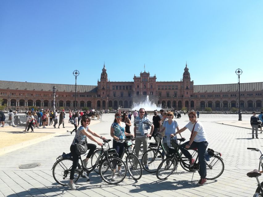 Seville: Highlights Bike Tour with Local Guide - Sliding into the old center: University area, Plaza del Triunfo, and Alcázar