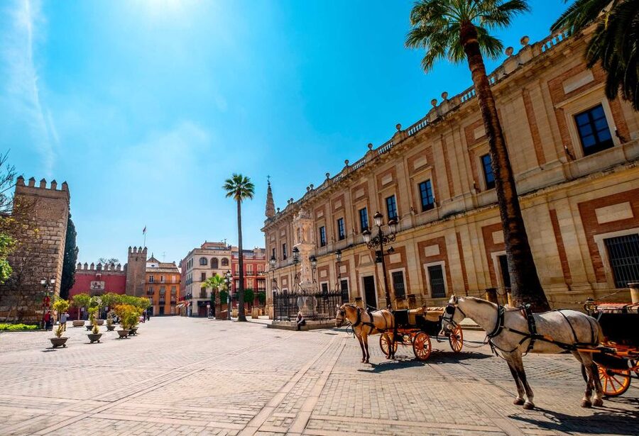 Seville: Small-Group City Highlights Walking Tour - Alcázar of Seville: The Power Story Behind the Walls