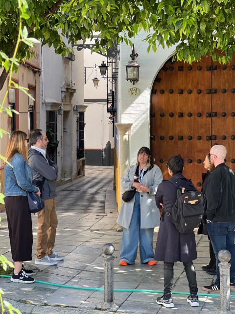 Seville: Small Group Jewish Quarter Tour with Tapas & Drinks - Calle Agua and Santa Cruz Square: When Street Names Teach You the City