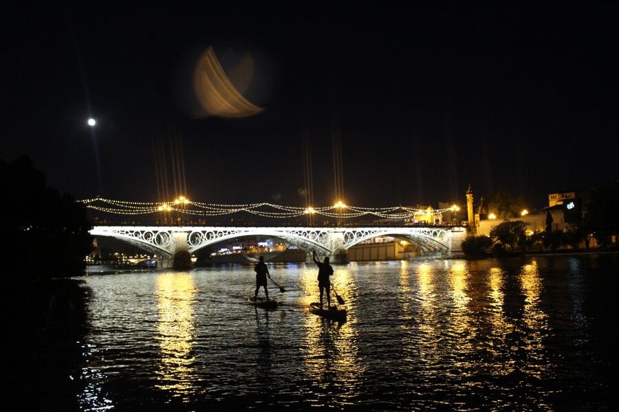 Seville: Sunset and Evening Paddle Boarding Tour - The out-and-back loop: San Telmo to Cachorro, both sides of the river