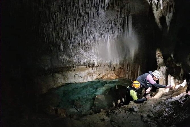 Small-Group Cova de Coloms Sea Caving Tour in Mallorca - Inside Cova de Coloms: Headlamps, Underground Lakes, and Tight Passages