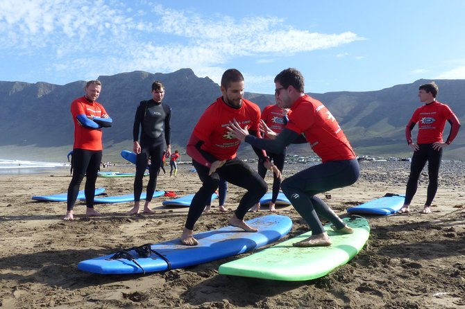 Surf class in Famara 9:15-12:00 or 11:45-14:30 (2h class) - In The Water Practice With Patient, Multilingual Coaches