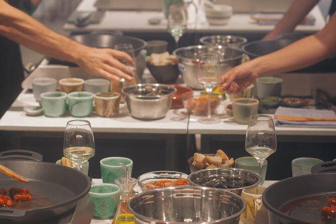 Taste of Spain: Tapas Cooking Class with Bottomless Wine Pairing - The 6-course dinner finish: a shared table, main, and dessert
