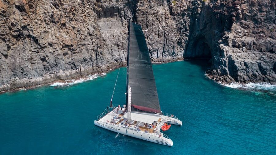 Tenerife: Catamaran Cruise with Brunch and Unlimited Drinks - The first sail west: cliffs and beaches in motion
