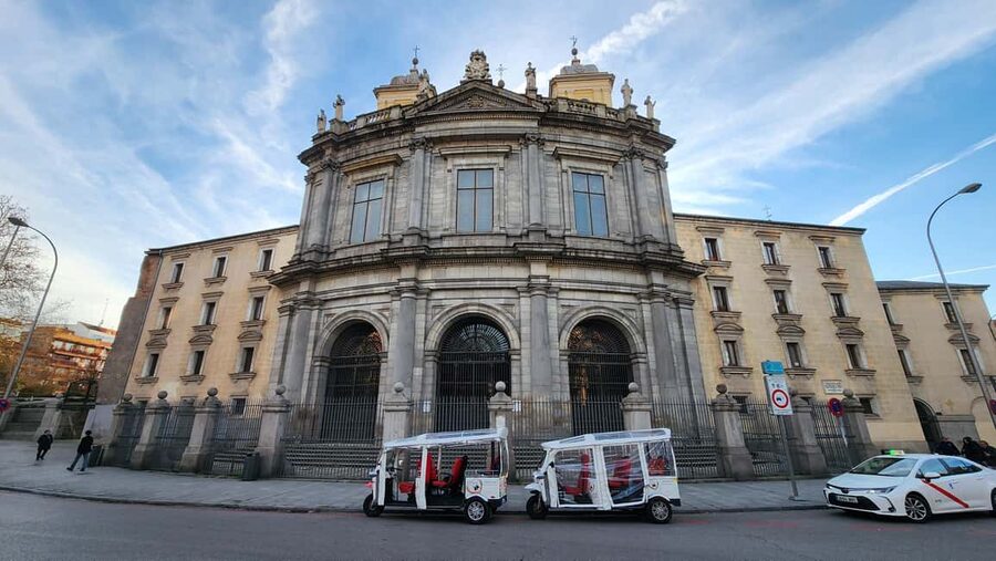 Tour Madrid: Secrets in a Electric Tuk Tuk - Plaza de España: Cervantes statue and big-city photo angles