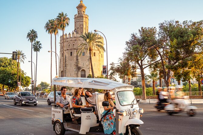 Tour Welcome Seville with Local Guide in Eco Tuk Tuk Private - María Luisa Park and Plaza de América: the green lungs and the calm in-between