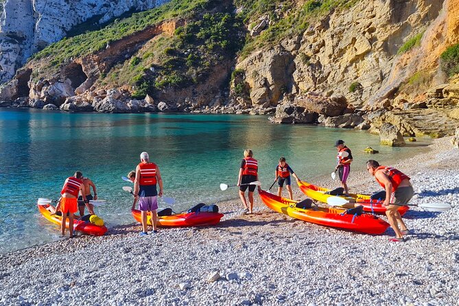 Uncharted Caves & Snorkelling Heaven: Cala Granadella Kayak Tour - Cala en Calo: a secluded sea-only bay