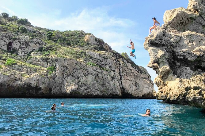 Uncharted Marine Reserve Cave, Snorkel & Cliff Jumping Kayak Tour - Getting Back Into the Kayaks After Water Time