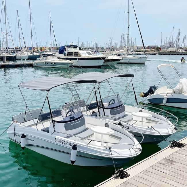 Valencia: Boat Rental without License - Leaving Valencia Marina: Malvarrosa Anchoring vs Port Saplaya