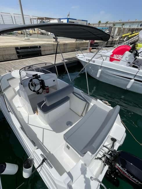 Valencia: Boat Rental without License - On-Board Swim Strategy: Anchor, Music, Ladder, and Cooler