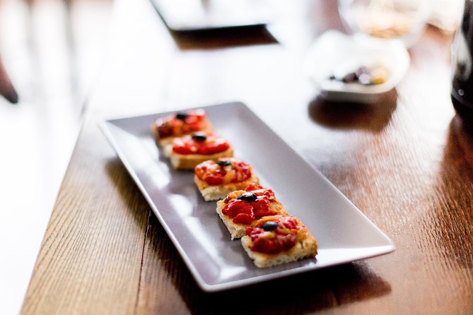 Valencia Old Town Tour with Wine & Tapas in 11th Century Historic Monument - What You Eat and Drink: Tapas, Paella, Dessert, and Prizewinning Wines