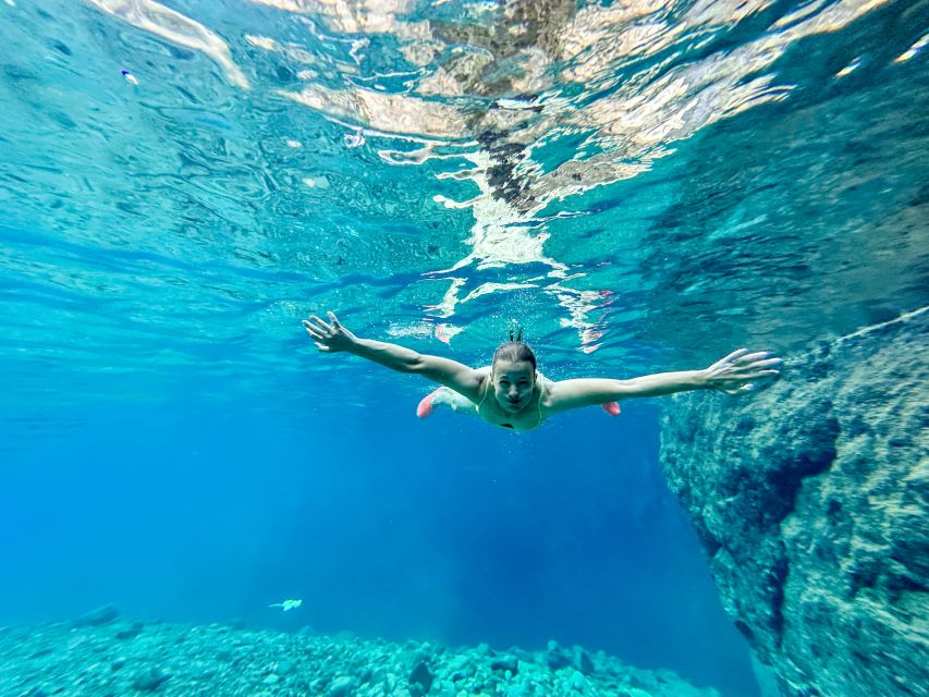 Valencia: Waterfalls and Thermal Springs Tour with Swimming - The canyon and dam stops: photos, scale, and a change of pace