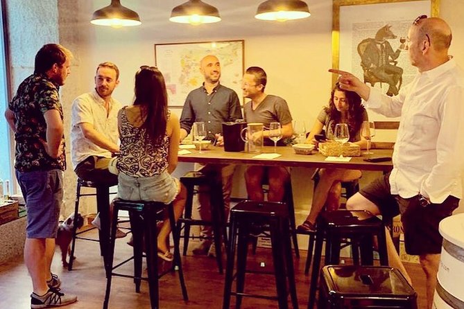 Wine Tasting near Plaza Mayor in Madrid - The Cozy Shop Setting, Where Jokes Still Teach